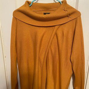 Oversized sweater with open cut in the front